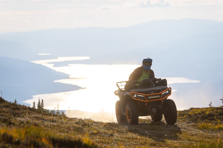 The author riding up a trail to the top of a mountain in British Columbia, Canada