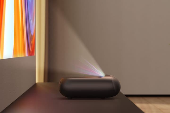 The Yaber K300s ultra-short-throw smart projector features a RGB triple-laser light engine