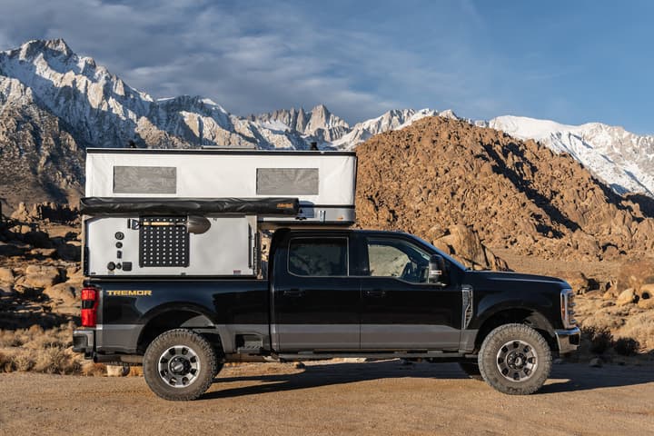 Shown here on a Ford F350 with 6-ft bed, the all-new CampOut from Four Wheel Campers helps to prepare and organize adventurers like no other camper out there