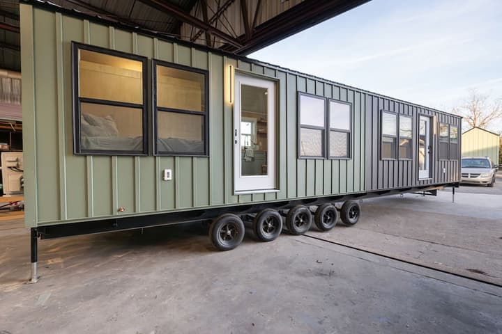 The TinyPlex is a duplex tiny house – so it holds two homes on one trailer – that costs US$118,500