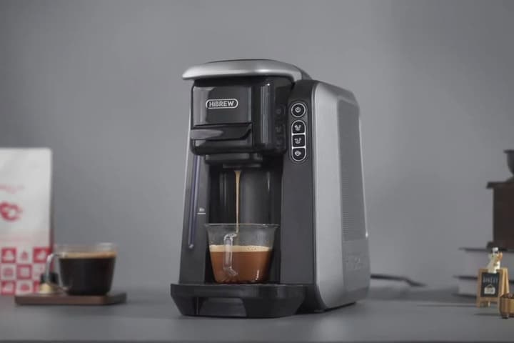 The HiBrew H6 automatically adjusts its settings for whichever brand of coffee pod you use, and brews a perfect cup at the press of a button