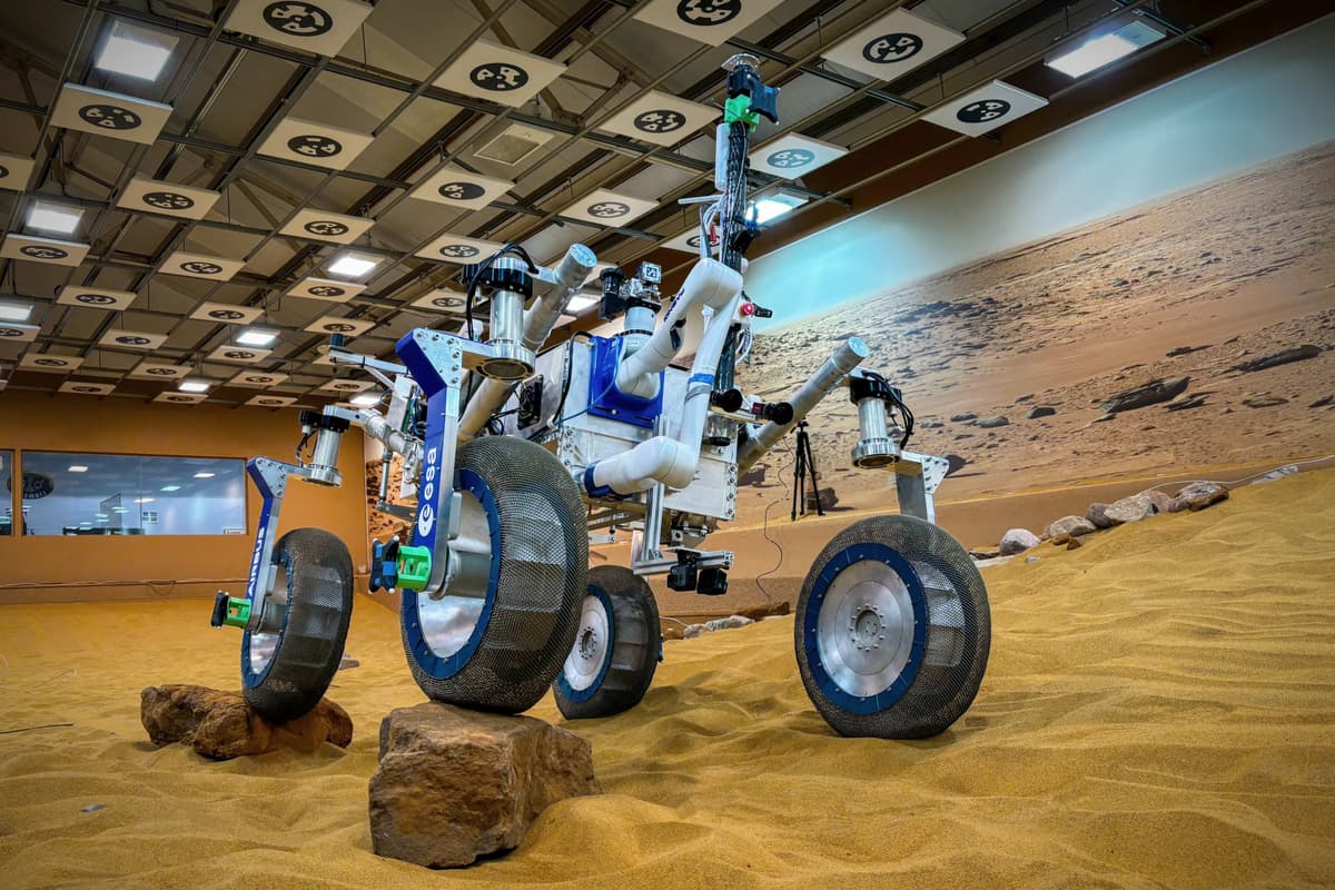 A test rover equipped with the new metal alloy tires takes on simulated Martian terrain at the Airbus Mars Yard in the UK