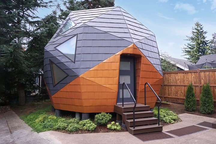 The Mini Dome is hailed as the world's first pentakis dodecahedron tiny house and features an unusual geodesic dome structure