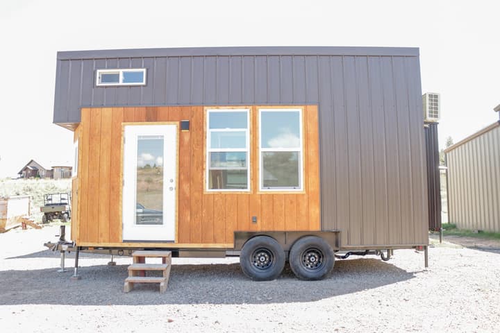 The Agatha, by Frontier Tiny Homes, is a pint-sized tiny house suitable for full-time living that includes two bedrooms