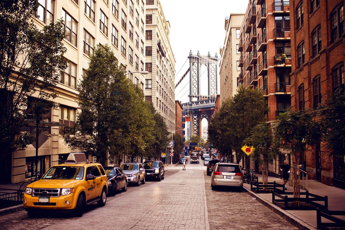 Streets such as Washington Street in New York City (actual photo shown) have their own distinct soundtracks that can be used to generate AI images of them